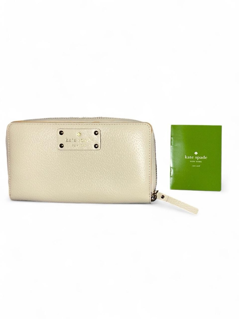 kate spade cream pebbled leather continental wallet
